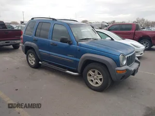 2004 Jeep Liberty Sport with VIN 1J4GK48K84W147282, listed as a IAAI auction lot 41888043 with 211,043 mi miles and . Bid and sale history available at carsss.com. Image 1.