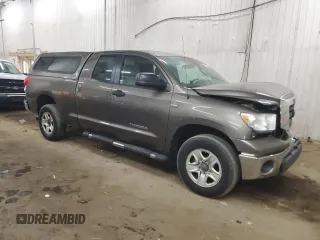 2009 Toyota Tundra z VIN 5TFBT54129X015491, wystawiony jako Copart lot #50884015 z przebiegiem 142 533 mil mil oraz Szkody całkowita. Historia ofert i sprzedaży dostępna na DreamBid. Obrazek 4.