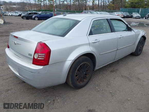 2009 Chrysler 300 Touring with VIN 2C3KA53V69H500462, listed as a IAAI auction lot 41896177 with 213,761 mi miles. Bid and sale history available at carsss.com. Image 4.