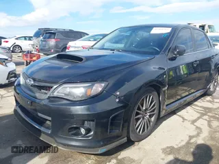 2014 Subaru Impreza Sedan WRX WRX Premium with VIN JF1GV7F6XEG011659, listed as a IAAI auction lot 41408915 with 133,836 mi miles. Bid and sale history available at carsss.com. Image 17.