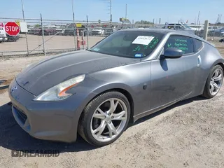 2012 Nissan 370Z z VIN JN1AZ4EH6CM561397, wystawiony jako IAAI lot #41812673 z przebiegiem 53 861 mil mil oraz . Historia ofert i sprzedaży dostępna na DreamBid. Obrazek 2.