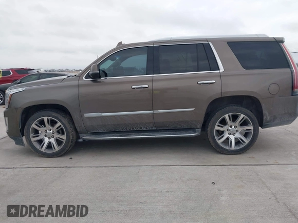 2015 Cadillac Escalade Luxury z VIN 1GYS3MKJ9FR725818, wystawiony jako IAAI lot #41596731 z przebiegiem 224 246 mil mil oraz . Historia ofert i sprzedaży dostępna na DreamBid. Obrazek 14.