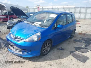 2007 Honda Fit Sport with VIN JHMGD386X7S029838, listed as a IAAI auction lot 41942513 with 141,612 mi miles. Bid and sale history available at carsss.com. Image 2.