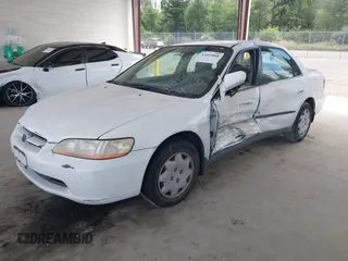 1998 Honda Accord LX with VIN 1HGCG5640WA004358, listed as a IAAI auction lot 42643808 with Not provided miles and . Bid and sale history available at DreamBid. Image 2.