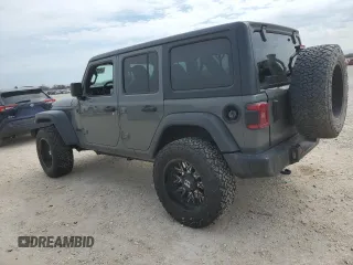 2020 Jeep Wrangler Unlimited Sport Altitude with VIN 1C4HJXDG2LW325430, listed as a Copart auction lot 46953185 with 69,919 mi miles and Salvage title. Bid and sale history available at DreamBid. Image 2.