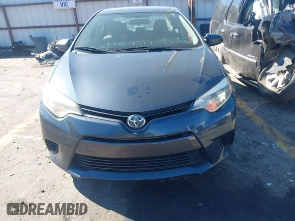 2015 Toyota Corolla L with VIN 2T1BURHE1FC295917, listed as a IAAI auction lot 41869602 with 99,773 mi miles and . Bid and sale history available at DreamBid. Image 12.