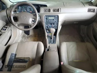 1998 Toyota Camry LE z VIN JT2BF28KXW0141801, wystawiony jako Copart lot #48014915 z przebiegiem 189 656 mil mil oraz Czysty tytuł • Clean title. Historia ofert i sprzedaży dostępna na DreamBid. Obrazek 8.