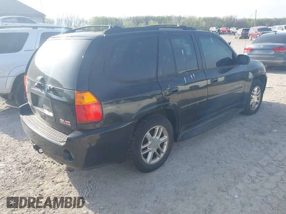 2008 GMC Envoy Denali with VIN 1GKET63M782214289, listed as a IAAI auction lot 42094430 with 250,000 mi miles. Bid and sale history available at carsss.com. Image 4.