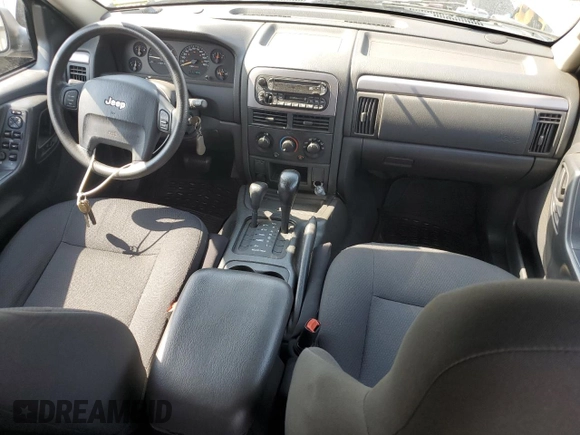 2004 Jeep Grand Cherokee Laredo with VIN 1J4GW48S44C282992, listed as a Copart auction lot 61523685 with 112,486 mi miles and Clean title. Bid and sale history available at DreamBid. Image 8.