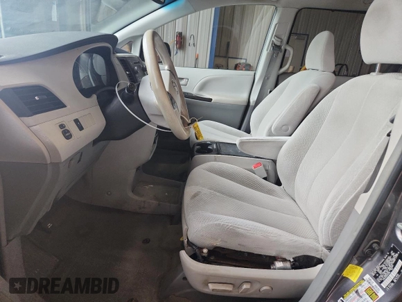 2013 Toyota Sienna LE AAS with VIN 5TDKK3DC0DS301864, listed as a Copart auction lot 62287335 with 195,075 mi miles and Clean title. Bid and sale history available at DreamBid. Image 7.