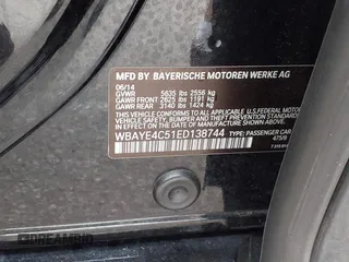 2014 BMW 7 Series 740Li with VIN WBAYE4C51ED138744, listed as a IAAI auction lot 42254213 with 116,157 mi miles and . Bid and sale history available at DreamBid. Image 9.