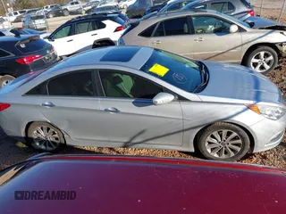 2014 Hyundai Sonata SE with VIN 5NPEC4AC0EH848726, listed as a IAAI auction lot 41747200 with 121,720 mi miles and . Bid and sale history available at DreamBid. Image 13.