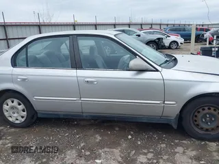 2000 Honda Civic VP z VIN 2HGEJ6613YH575630, wystawiony jako IAAI lot #41525214 z przebiegiem 251 481 mil mil oraz . Historia ofert i sprzedaży dostępna na DreamBid. Obrazek 13.