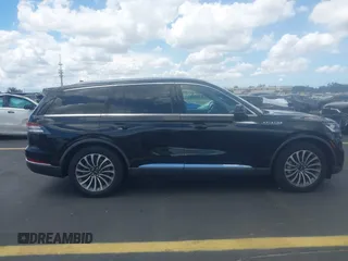 2021 Lincoln Aviator Reserve with VIN 5LM5J7WC0MGL12385, listed as a IAAI auction lot 42472422 with 20,404 mi miles and . Bid and sale history available at DreamBid. Image 13.