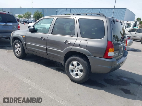 2003 Mazda Tribute LX with VIN 4F2YZ04193KM08890, listed as a IAAI auction lot 42158385 with 282,314 mi miles and . Bid and sale history available at carsss.com. Image 3.
