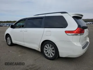2012 Toyota Sienna LE with VIN 5TDJK3DC5CS040337, listed as a Copart auction lot 50701935 with 201,024 mi miles and Salvage Title. Bid and sale history available at carsss.com. Image 2.