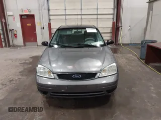 2007 Ford Focus S with VIN 1FAFP37N87W333049, listed as a IAAI auction lot 41450683 with 307,869 mi miles and . Bid and sale history available at carsss.com. Image 12.