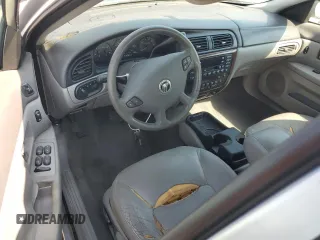 2002 Mercury Sable LS z VIN 1MEHM55SX2A619019, wystawiony jako Copart lot #74205254 z przebiegiem 71 677 mil mil oraz Szkody całkowita. Historia ofert i sprzedaży dostępna na DreamBid. Obrazek 8.