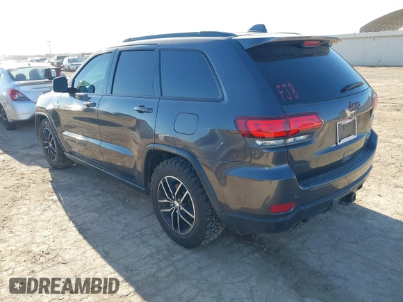 2018 Jeep Grand Cherokee Trailhawk with VIN 1C4RJFLT9JC244212, listed as a IAAI auction lot 41443469 with 77,953 mi miles and . Bid and sale history available at DreamBid. Image 3.