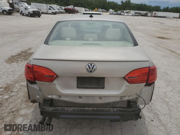 2014 Volkswagen Jetta SE with VIN 3VWD07AJ6EM209228, listed as a Copart auction lot 60500525 with 118,261 mi miles and Salvage title. Bid and sale history available at DreamBid. Image 6.