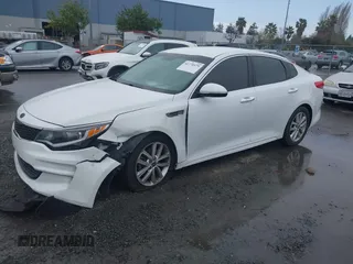 2016 Kia Optima LX with VIN 5XXGT4L30GG049534, listed as a IAAI auction lot 41770579 with 94,257 mi miles. Bid and sale history available at carsss.com. Image 2.