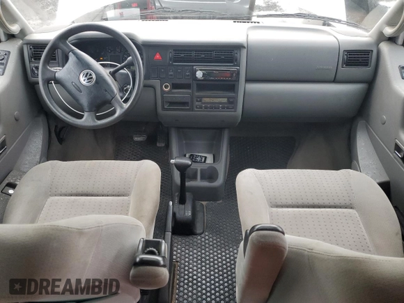 2001 Volkswagen EuroVan MV с VIN WV2MB47031H098986, выставлен на аукционе Copart как лот 77587294 с пробегом 161 046 миль миль и Чистый • Clean title. История ставок и продаж доступна на DreamBid. Изображение 8.