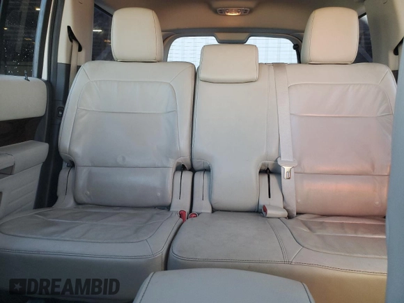 2012 Ford Flex SEL z VIN 2FMHK6CC9CBD20700, wystawiony jako Copart lot #42227855 z przebiegiem 194 889 mil mil oraz Szkoda całkowita • Salvage title. Historia ofert i sprzedaży dostępna na DreamBid. Obrazek 10.