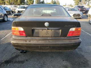 1997 BMW 3 Series 328iA with VIN WBACD4325VAV48712, listed as a Copart auction lot 80376064 with 158,118 mi miles and Salvage Title. Bid and sale history available at carsss.com. Image 6.