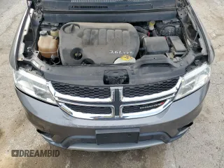 2013 Dodge Journey SXT with VIN 3C4PDCBG5DT695888, listed as a Copart auction lot 50302485 with 126,720 mi miles and Salvage Title. Bid and sale history available at DreamBid. Image 12.