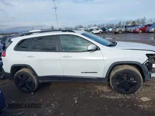 2020 Jeep Cherokee Altitude with VIN 1C4PJMLX0LD501883, listed as a IAAI auction lot 41141170 with 134,071 mi miles. Bid and sale history available at carsss.com. Image 14.