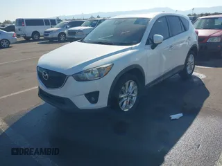 2014 Mazda CX-5 Grand Touring with VIN JM3KE4DY4E0375809, listed as a IAAI auction lot 41468078 with 151,226 mi miles. Bid and sale history available at carsss.com. Image 17.