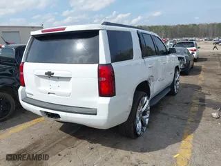 2019 Chevrolet Tahoe LT with VIN 1GNSCBKC6KR345154, listed as a IAAI auction lot 41808536 with 124,325 mi miles. Bid and sale history available at carsss.com. Image 4.