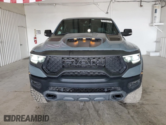 2021 Ram 1500 with VIN 0K1905786880, listed as a Copart auction lot 61756114 with 34,927 mi miles and Clean title. Bid and sale history available at DreamBid. Image 5.