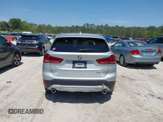 2021 BMW X1 sDrive28i with VIN WBXJG7C06M5T14235, listed as a IAAI auction lot 42021762 with 53,384 mi miles and . Bid and sale history available at DreamBid. Image 16.