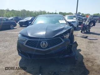 2018 Acura TLX w/A-SPEC Pkg with VIN 19UUB3F63JA001911, listed as a IAAI auction lot 42167622 with 114,845 mi miles and . Bid and sale history available at DreamBid. Image 13.