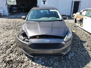 2018 Ford Focus SE with VIN 1FADP3FE5JL255010, listed as a Copart auction lot 54478335 with 118,074 mi miles and Salvage Title. Bid and sale history available at carsss.com. Image 5.