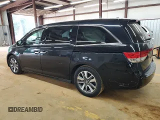 2015 Honda Odyssey Touring Elite with VIN 5FNRL5H99FB005576, listed as a Copart auction lot 58963215 with 167,967 mi miles and Salvage title. Bid and sale history available at DreamBid. Image 2.