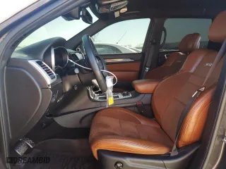 2021 Jeep Grand Cherokee SRT with VIN 1C4RJFDJ7MC798933, listed as a Copart auction lot 46900605 with 59,161 mi miles and Salvage Title. Bid and sale history available at carsss.com. Image 7.