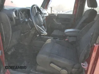 2012 Jeep Wrangler Sport z VIN 1C4AJWAG9CL150787, wystawiony jako Copart lot #50863415 z przebiegiem 68 623 mil mil oraz Szkoda całkowita • Salvage title. Historia ofert i sprzedaży dostępna na DreamBid. Obrazek 7.