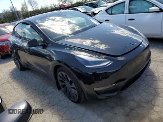 2023 Tesla Model Y Performance z VIN 7SAYGDEFXPF948763, wystawiony jako Copart lot #50562134 z przebiegiem 948 mil mil oraz Szkoda całkowita • Salvage title. Historia ofert i sprzedaży dostępna na DreamBid. Obrazek 4.