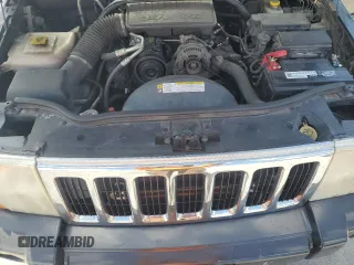 2008 Jeep Commander Sport with VIN 1J8HH48K08C209220, listed as a Copart auction lot 54920625 with 234,573 mi miles and Salvage Title. Bid and sale history available at DreamBid. Image 12.