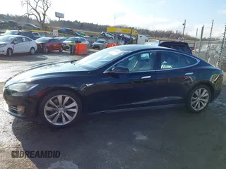 2016 Tesla Model S 70 with VIN 5YJSA1E11GF124965, listed as a IAAI auction lot 41458132 with Not provided miles and . Bid and sale history available at DreamBid. Image 14.