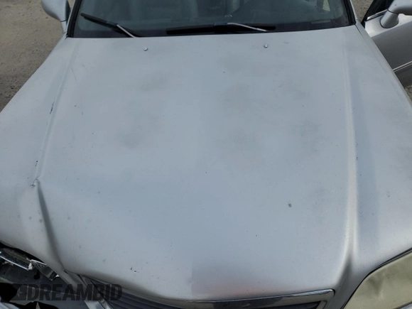 2004 Acura RL w/Navigation System z VIN JH4KA96664C003428, wystawiony jako Copart lot #87115774 z przebiegiem 164 527 mil mil oraz Szkoda całkowita • Salvage title. Historia ofert i sprzedaży dostępna na DreamBid. Obrazek 11.