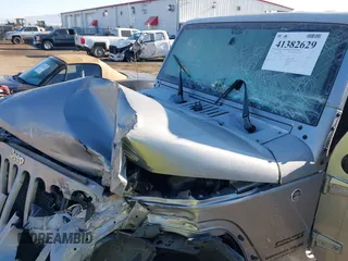 2018 Jeep Wrangler JK Unlimited Sport S with VIN 1C4BJWDG5JL926703, listed as a IAAI auction lot 41382629 with 66,567 mi miles. Bid and sale history available at carsss.com. Image 21.