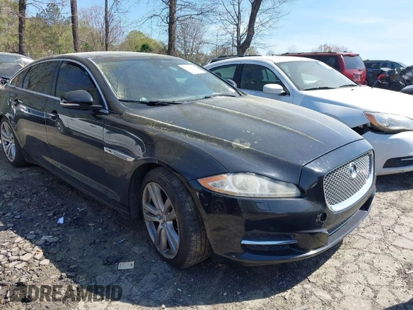 2013 Jaguar XJ Portfolio z VIN SAJWJ2GD0D8V49329, wystawiony jako IAAI lot #41829426 z przebiegiem 125 584 mil mil oraz . Historia ofert i sprzedaży dostępna na DreamBid. Obrazek 1.