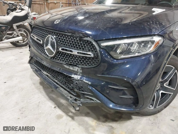 2023 Mercedes-Benz GLC with VIN W1NKM4HB9PF028986, listed as a IAAI auction lot 41611041 with 22,617 mi miles. Bid and sale history available at carsss.com. Image 6.