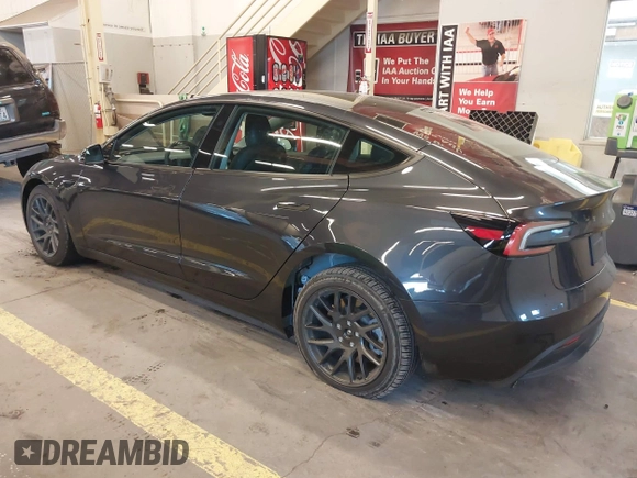 2024 Tesla Model 3 with VIN 5YJ3E1EA9RF835440, listed as a IAAI auction lot 41255559 with 4,789 mi miles. Bid and sale history available at carsss.com. Image 3.