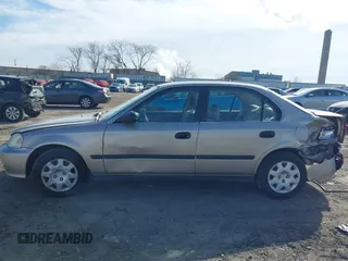 2000 Honda Civic LX with VIN 1HGEJ6679YL066102, listed as a IAAI auction lot 41585270 with 164,714 mi miles. Bid and sale history available at carsss.com. Image 13.
