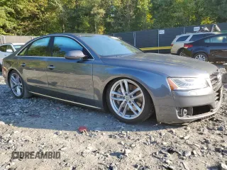 2015 Audi A8 with VIN WAUJGAFD3FN013026, listed as a Copart auction lot 67650374 with 88,064 mi miles and Salvage title. Bid and sale history available at DreamBid. Image 4.