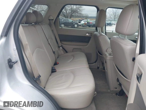 2009 Mercury Mariner Premier with VIN 4M2CU97719KJ15260, listed as a IAAI auction lot 41500367 with 104,063 mi miles. Bid and sale history available at carsss.com. Image 8.